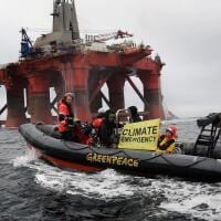 Activists on Boat alongside BP Oil Rig in the North Sea