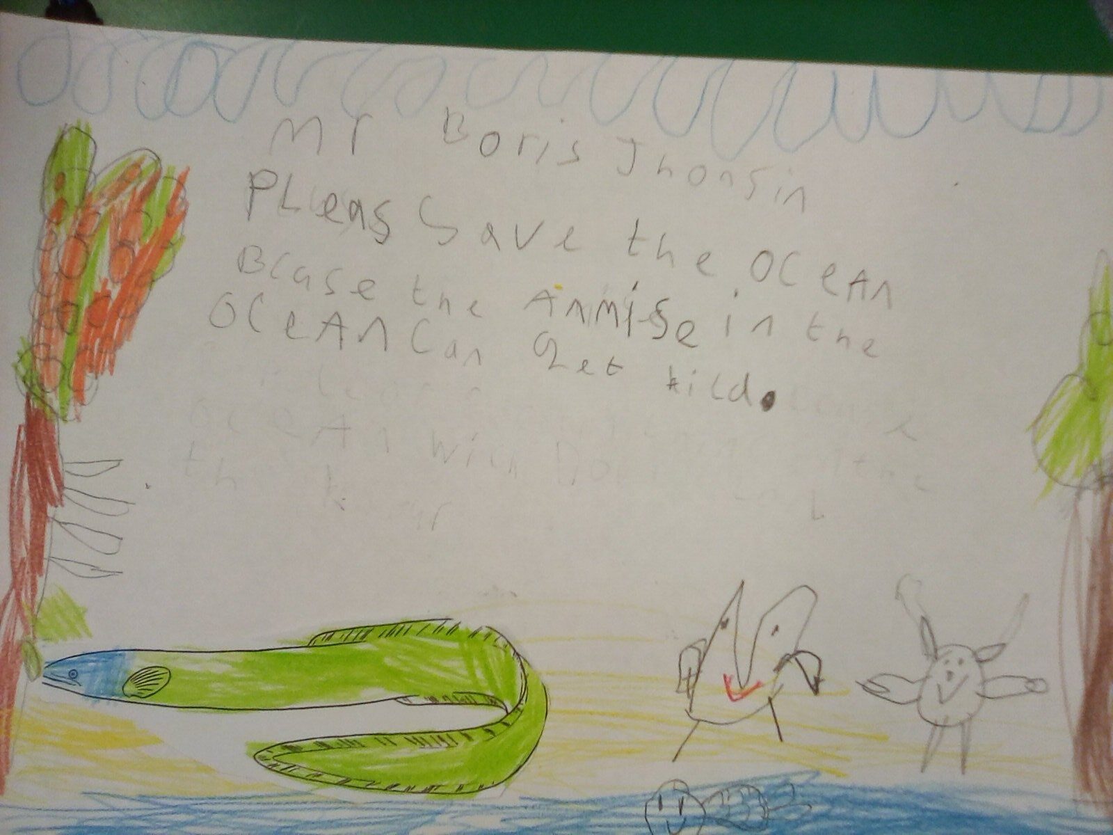 Poster drawn by a school pupil calling for better ocean protection. Features colourful sea creatures and a message to Prime Minister Boris Johnson