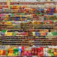 Aerial view of colourful products arranged on supermarket shelves