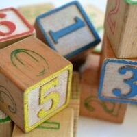 Colourful wooden blocks painted with letters and numbers