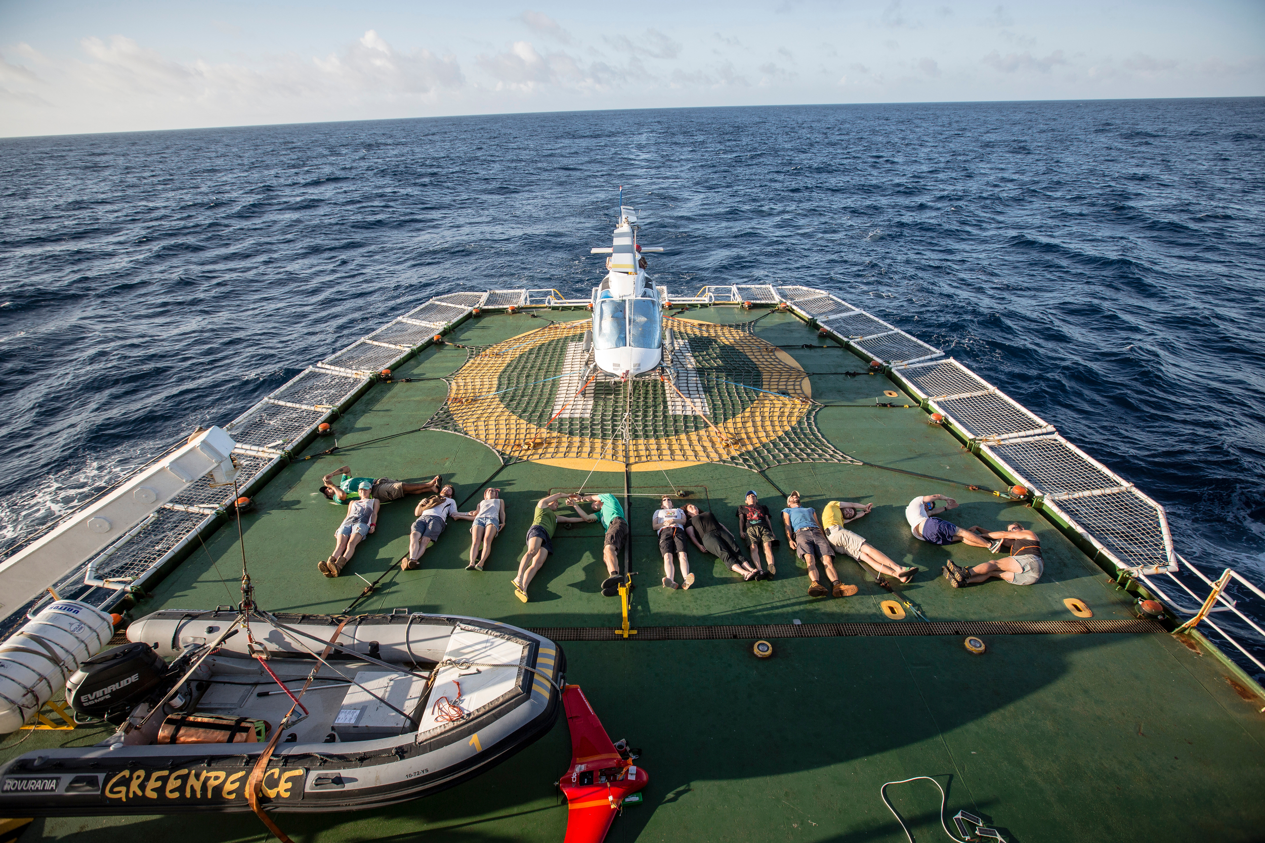 Crew members lie on the deck of the Esperanza to form the word 'Thanks.' 