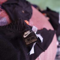 Nike label on black textile offcuts