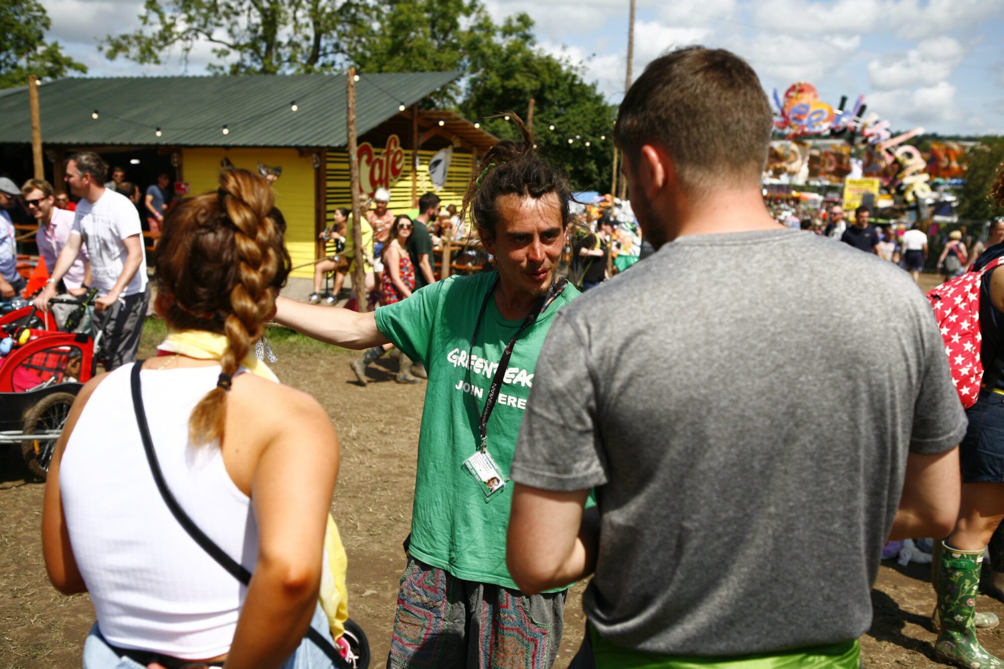 A Greenpeace volunteer speaks to the public at a festival