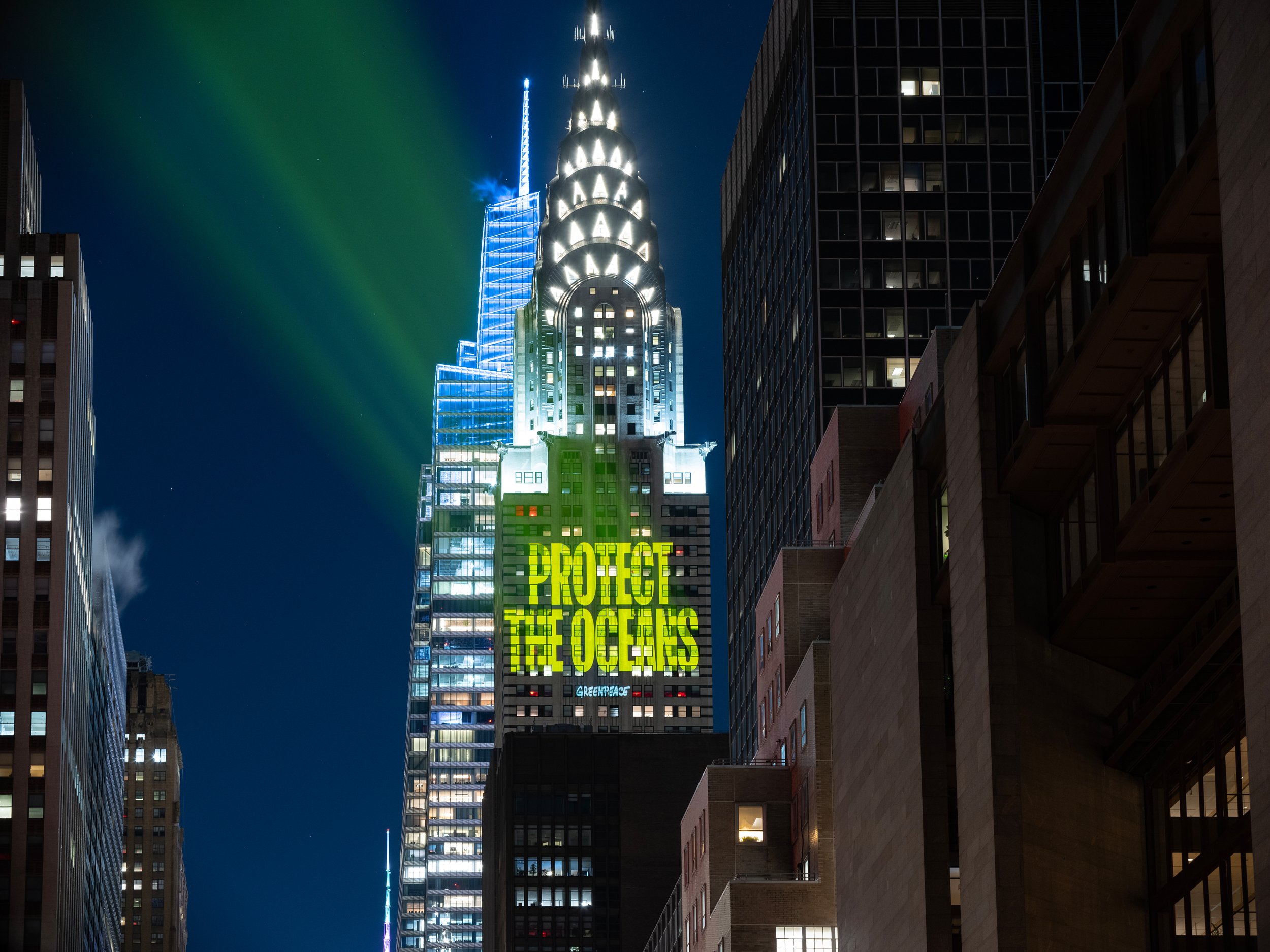 'Protect the oceans' slogan is projected on the side of the iconic Chrysler building in New York.
