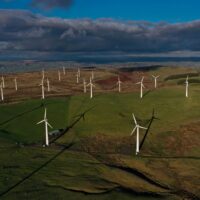 Aerial view of wind turbines in a moorland landscape