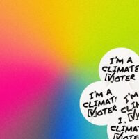 Stickers saying 'I'm a climate voter'