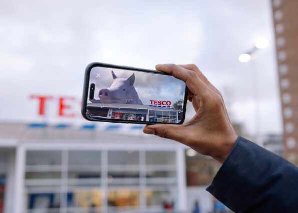 Giant Virtual Pig SOW is seen on the new app at Tesco, Hackney