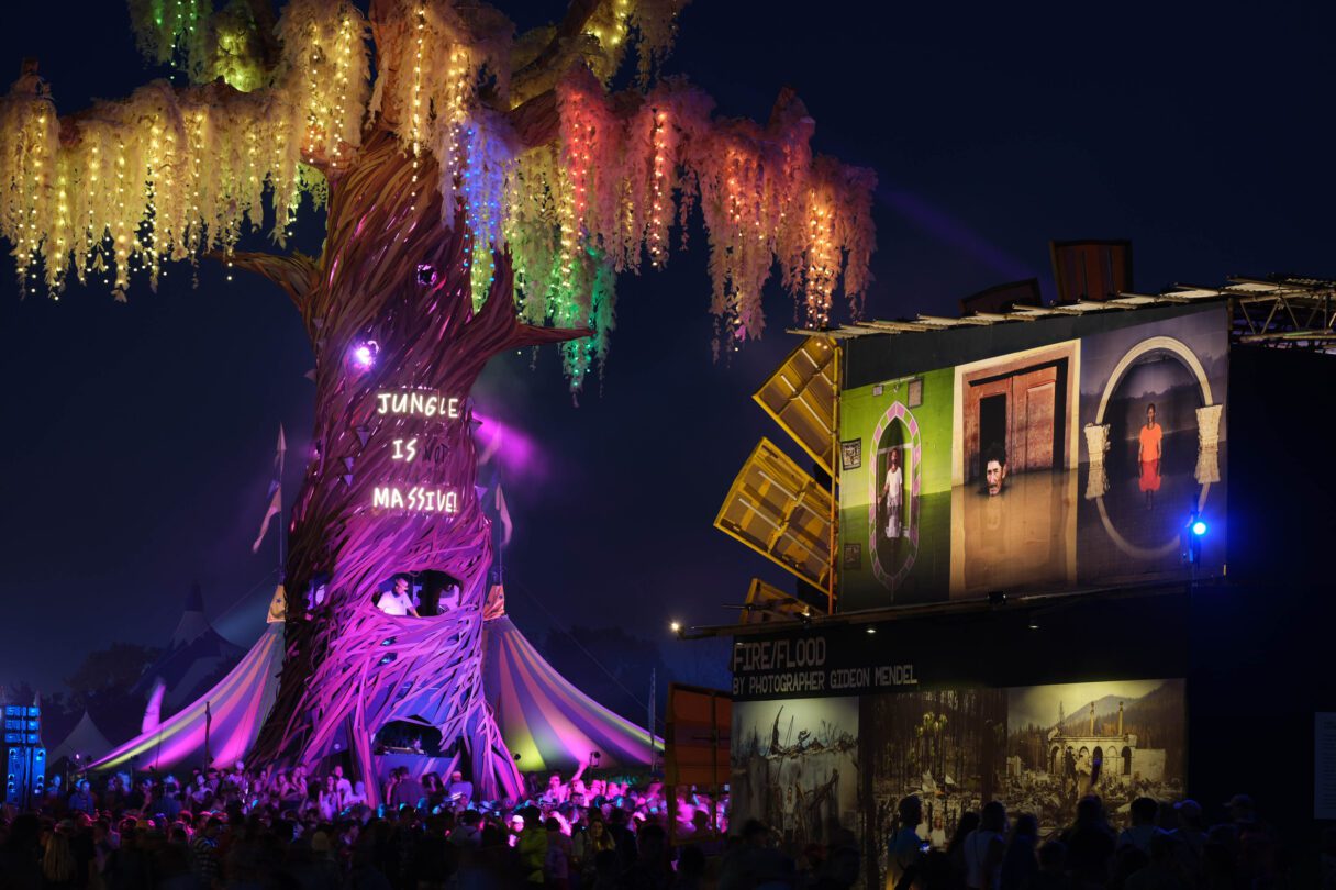 The 'rave tree' in the Greenpeace field at Glastonbury - a giant pretend tree with a DJ booth in the trunk and colourful lights.