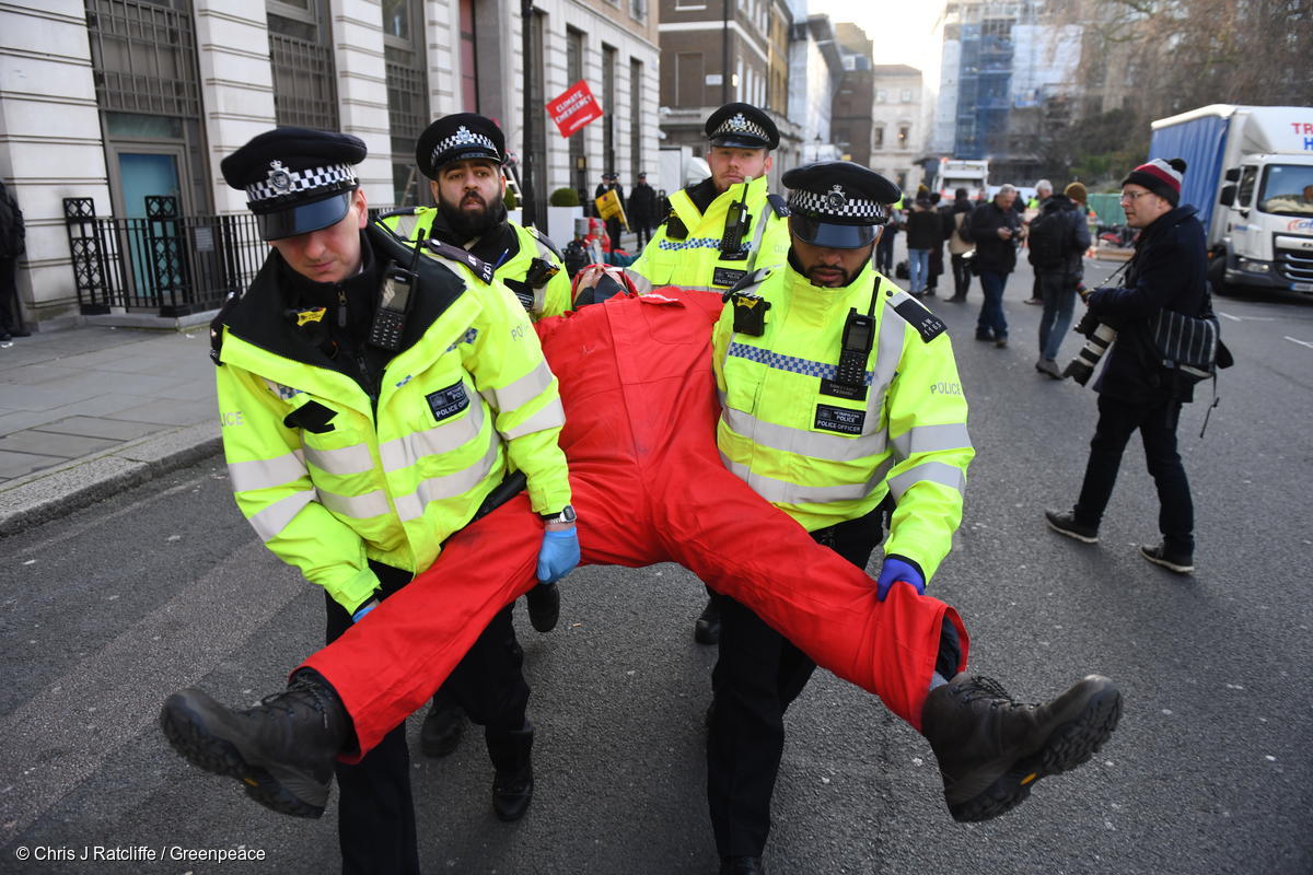 UPDATE: Greenpeace activists remain locked onto dirty oil barrels at BP HQ 
