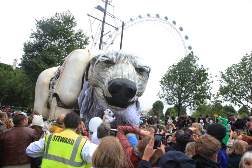 Giant polar bear puppet in front of London Eye