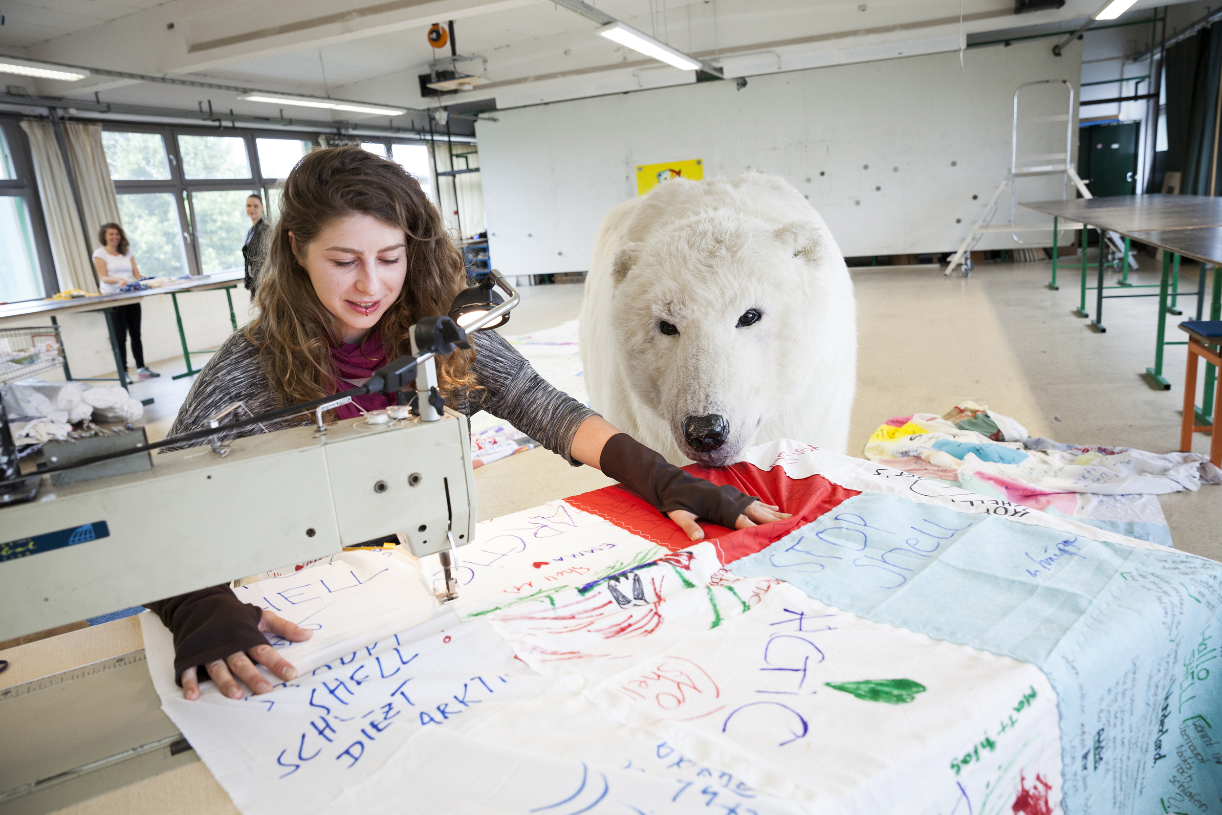 volunteer sewing banners