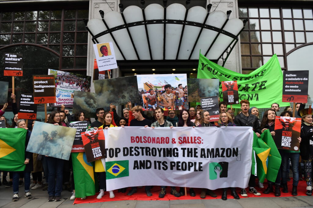The UK Student Climate Network, Survival international and Greenpeace protest against the visit of the Brazilian environment minister, Ricardo Salles outside the Brazilian Embassy. They send a clear message to Salles that until his government’s destructive agenda is reversed and the Amazon and its people are protected, he is not welcome here.