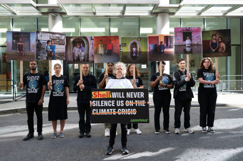 Activists in matching T-shirts with a Globe and 