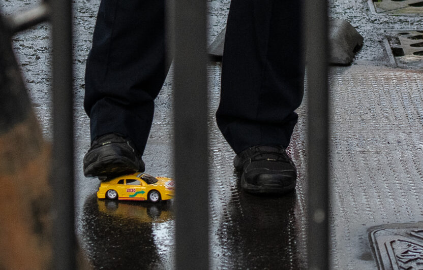 Greenpeace races toy cars under Downing Street gates urging PM to put electric vehicles on ‘fast track to 2030’