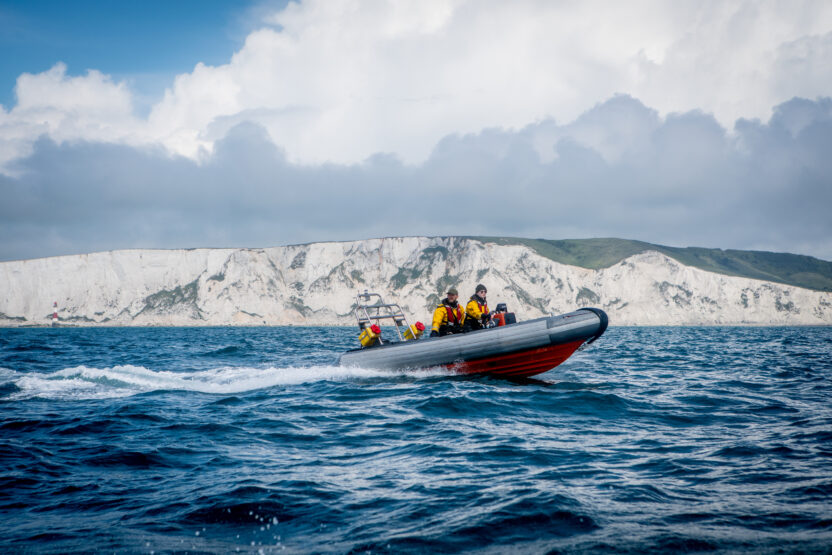 Caroline Lucas joins Greenpeace in protest at sea against industrial fishing damaging Sussex protected areas