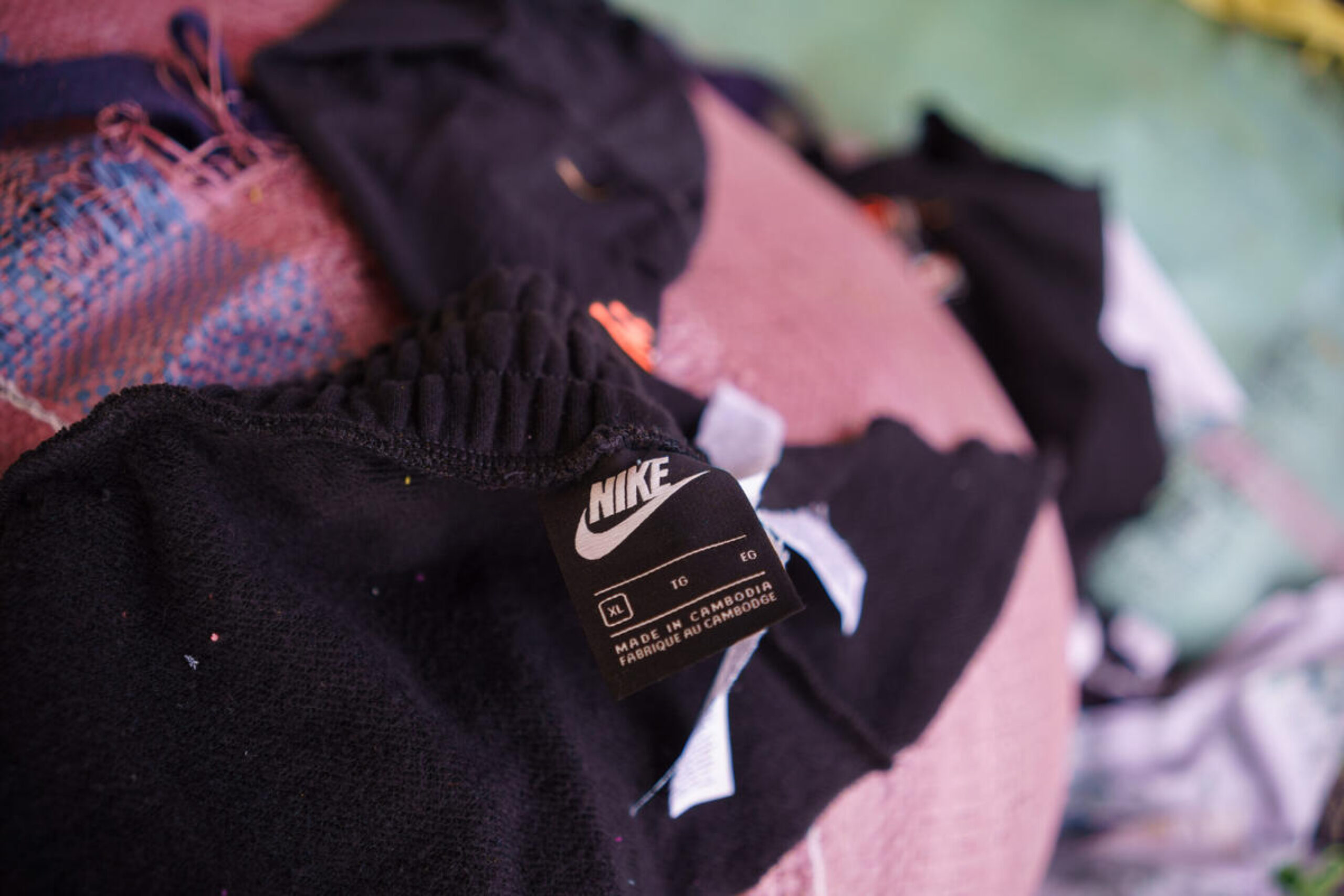 Nike label on black textile offcuts