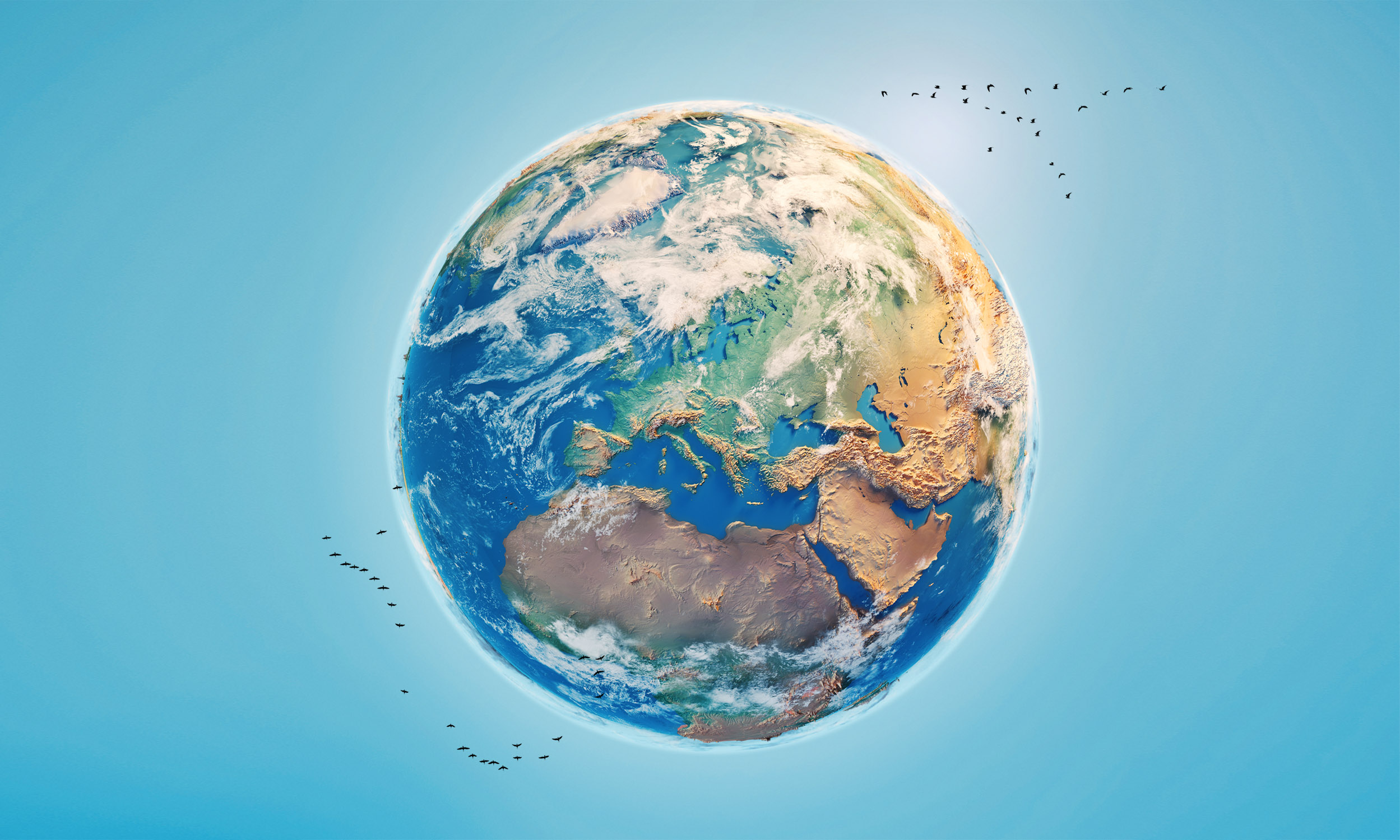 Beautiful 3D illustration of the Earth, centred on Europe and Africa, on a background of a clear, blue sky.