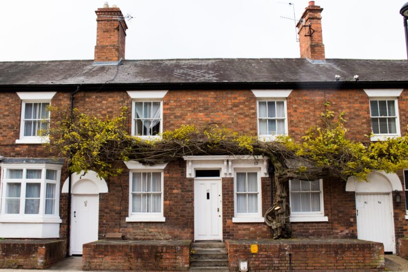 A row of terraced red brick houses