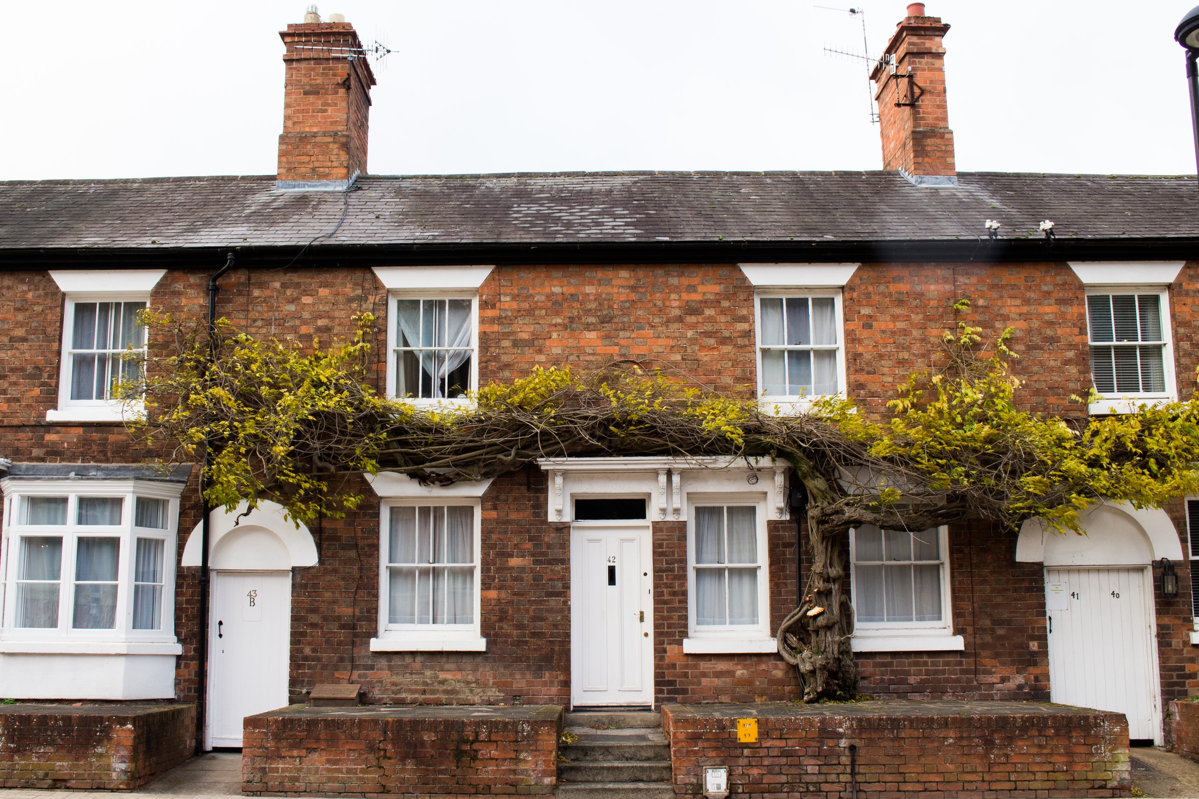 A row of terraced red brick houses