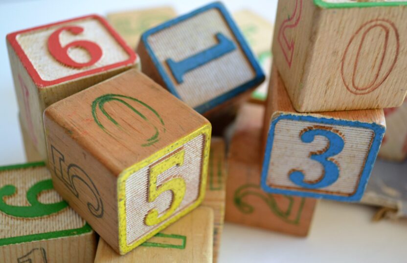 Colourful wooden blocks painted with letters and numbers