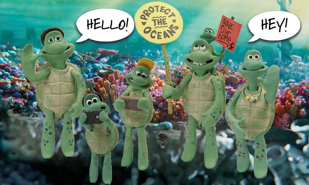 The family of cartoon sea turtles stand together, waving at the camera and holding placards with ocean protection slogans. Speech bubbles read 'Hello!' and 'Hey!'