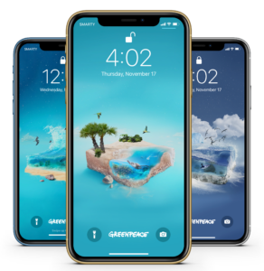 Three mobile phones, showcasing Greenpeace's oceans virtual gifts wallpapers. This image centres the Atlantic Ocean gift wallpaper.