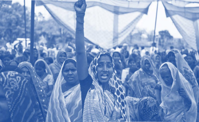 Woman at a protest with her fist in the air