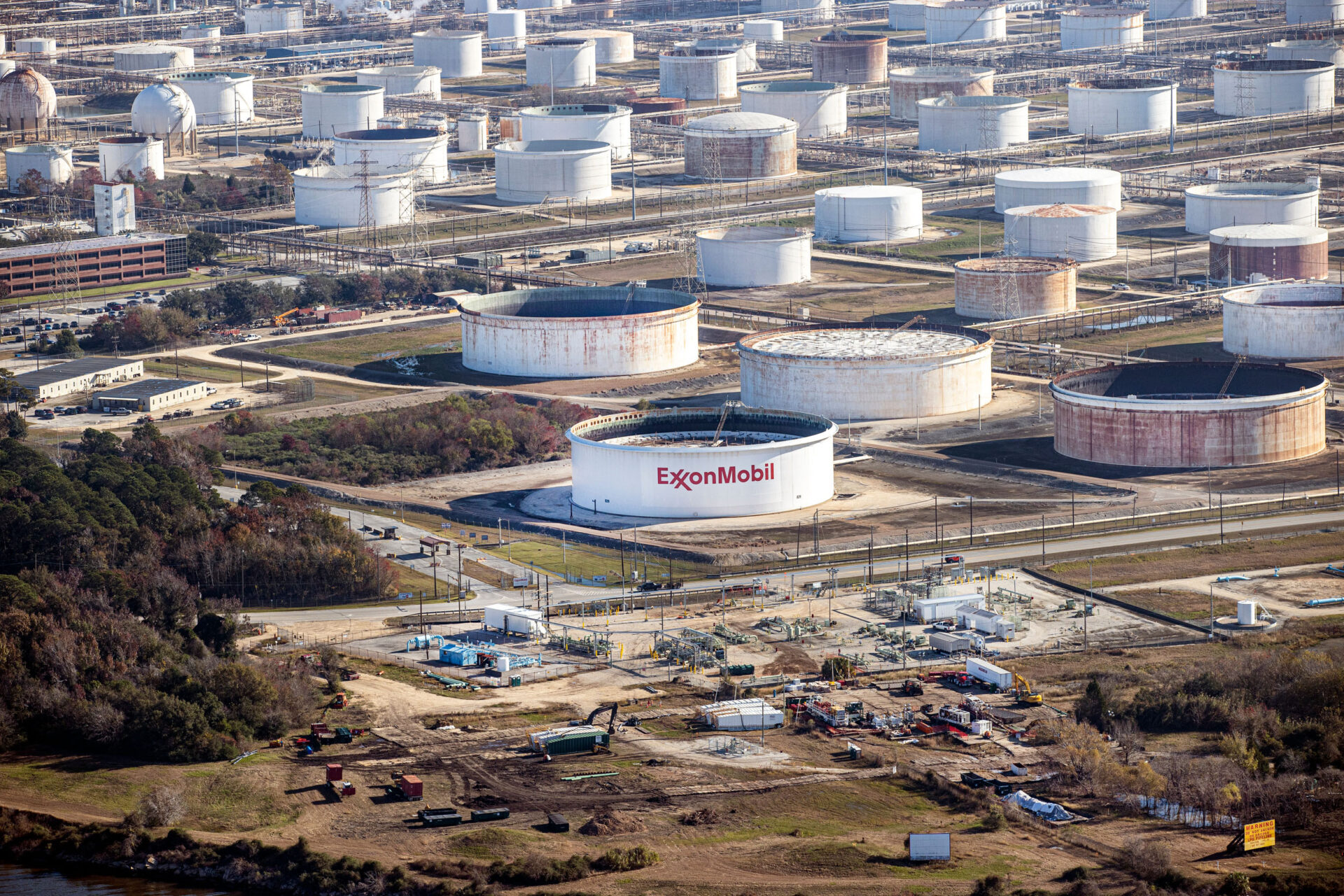 Aerial view of oil storage facilities in Texas with the Exxon logo.