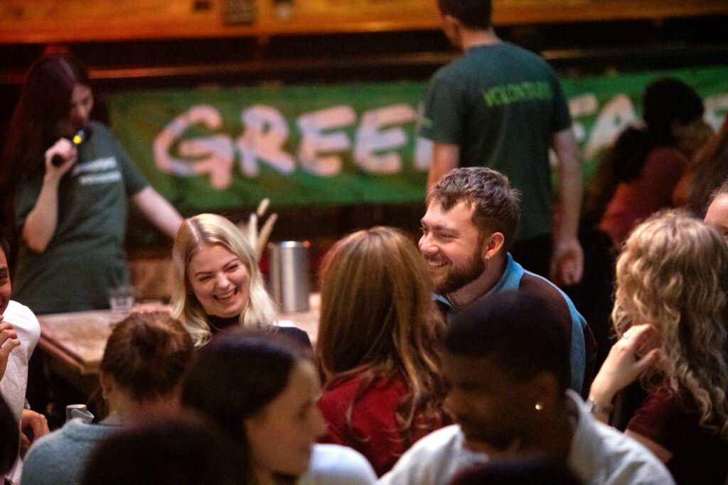 People enjoying a pub quiz